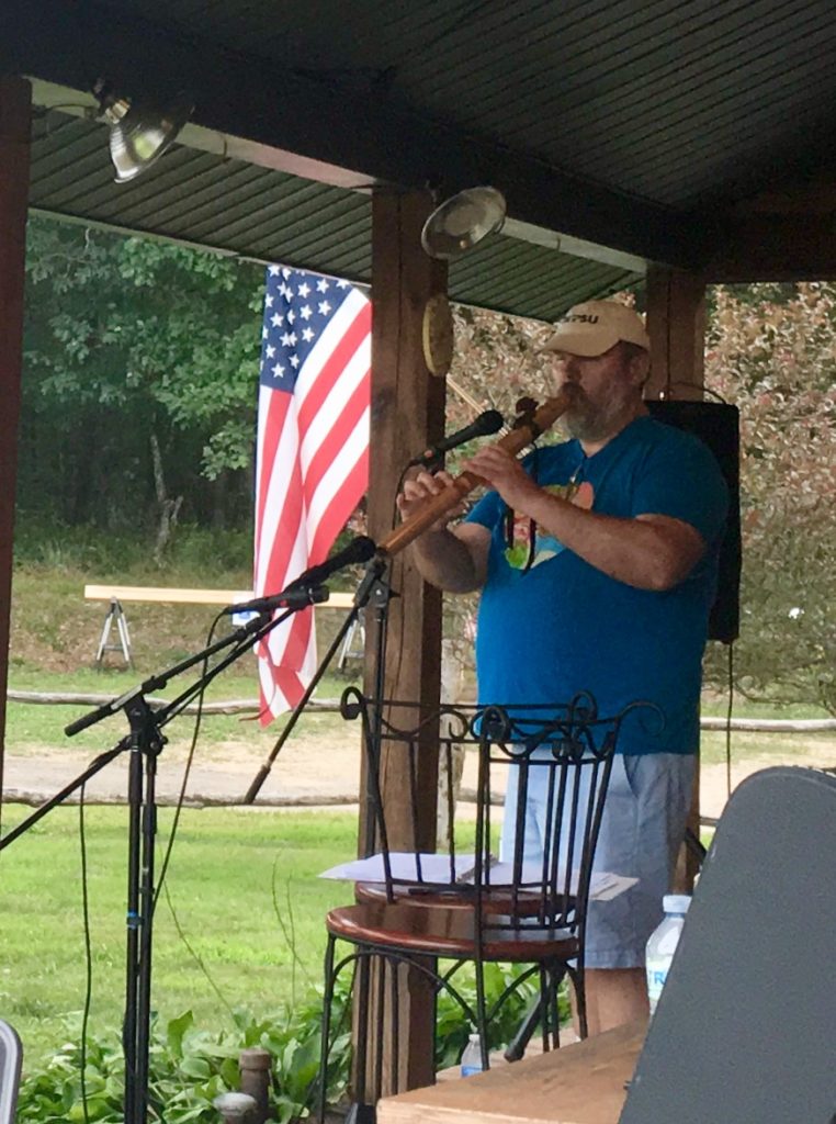 Steve Van Hook playing a Native American flute.