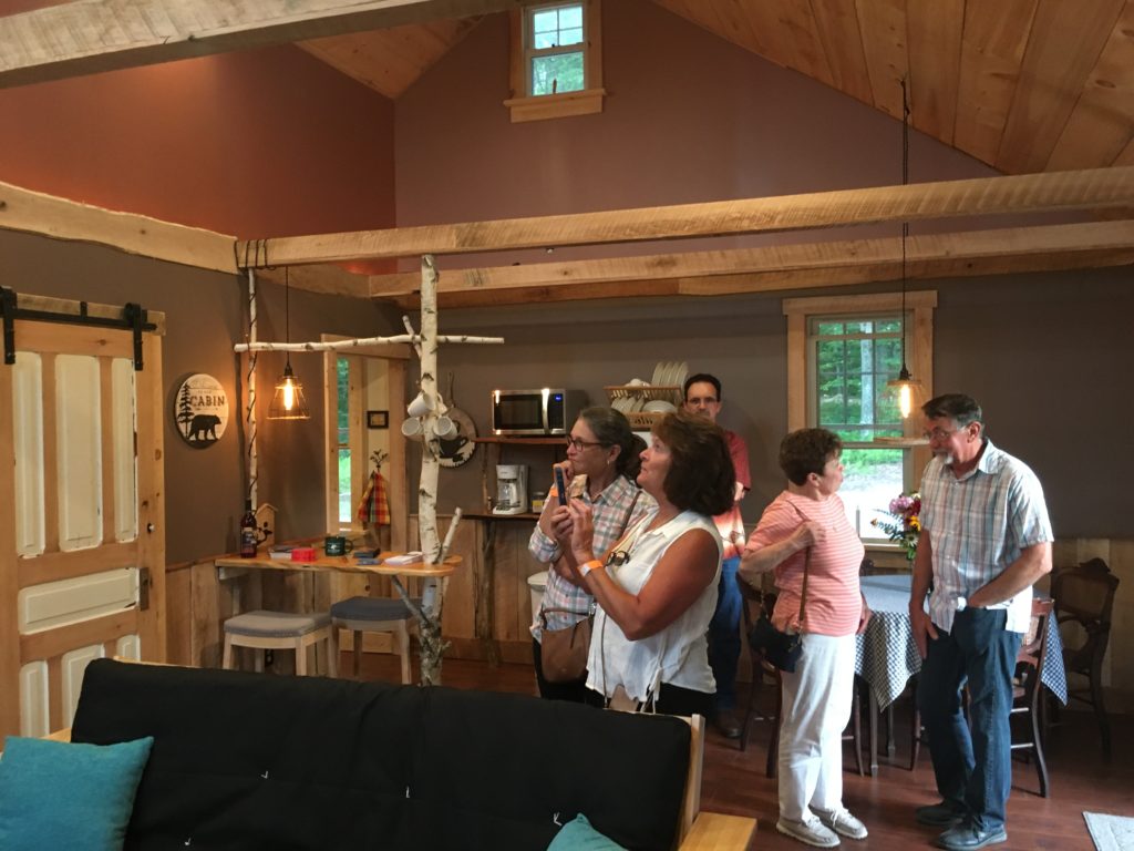 People touring the cabin